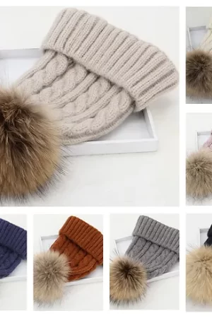Our Rabbit Blend Hats with Fox Poms are available in an array of colors. Crafted from a luxurious blend of rabbit, offering unparalleled softness and...