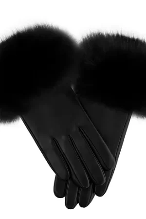 Our black leather gloves with black fox trim blend style with warmth. Made from black leather, these gloves are durable and offer a sophisticated look.
